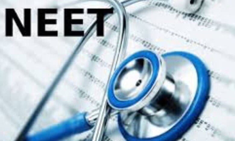 Stethoscope and NEET exam papers on desk, highlighting exam security ahead of NEET UG.