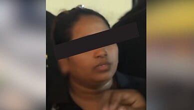 Female bouncer abusing SRH fan during IPL match at Uppal stadium.