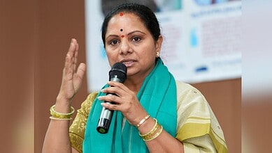 Kavitha speaking at a press conference about farmers' concerns over Pharma City and government transparen.