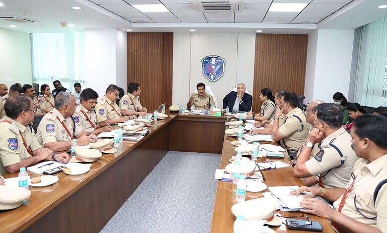 Police officers and officials in a meeting room discussing drug eradication strategies, highlighting poli.