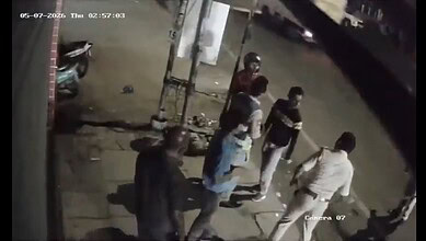 A police officer beats a delivery agent in Hyderabad