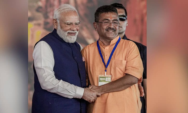 Suvendu Adhikari taking oath as West Bengal's first BJP Chief Minister during a formal political event.