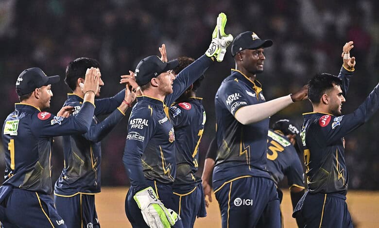 The Siasat Daily, cricket players celebrating on the field after a successful match.
