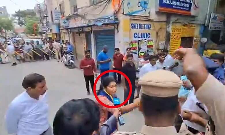 A woman activist detained during protest against PM Narendra Modi's convoy in Secunderabad, surrounded by.