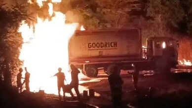 Tanker on fire in Sangareddy after chemical accident, emergency responders at the scene.