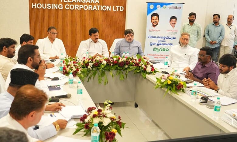 A meeting of officials and stakeholders at Telangana Housing Corporation LTD office, discussing housing d.