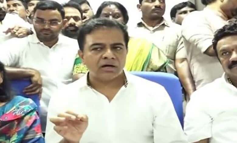 A man speaking to a group of people during a press conference or meeting.