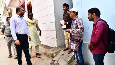 GHMC Commissioner RV Karnan interacts with people during census enumeration