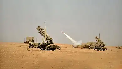 Representative image of a Saudi air defence missile system in a desert area.