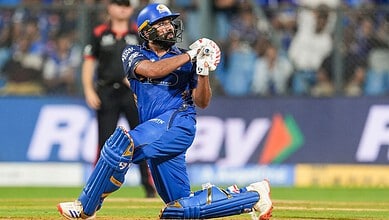 Rohit Sharma and Kyle Rickelton celebrate their half-centuries during Mumbai Indians' victory over LSG.