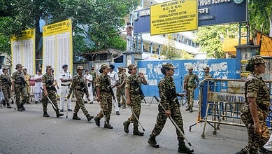 West Bengal Minister and Trinamool Congress (TMC) candidate Shashi Panja with others outside a strong room, ahead of the counting of votes for the West Bengal Assembly elections, in Kolkata, Friday, May 1, 2026. (PTI Photo)
