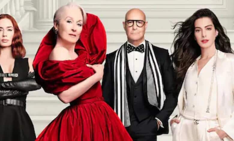 Four actors from The Devil Wears Prada 2 cast posing on stairs in stylish outfits.
