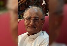 Dr Mohammad Iqbal Sanai seated and smiling in Hyderabad before his passing.