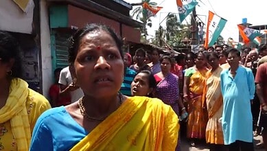 Crowd of voters and election officials during repoll at Falta constituency, West Bengal.