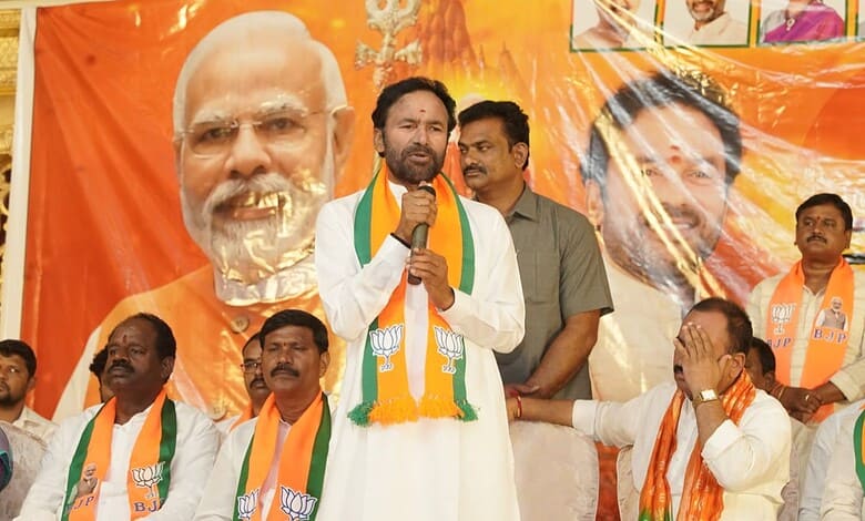People practicing Bhujangasana yoga pose during record event in Hyderabad.