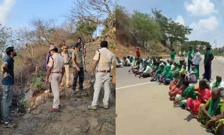 Community gathering and officials inspecting outdoor area with people seated on the road.