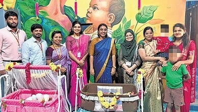 Children and staff at Karnataka's first childcare centre for inmates' children, celebrating a significant.
