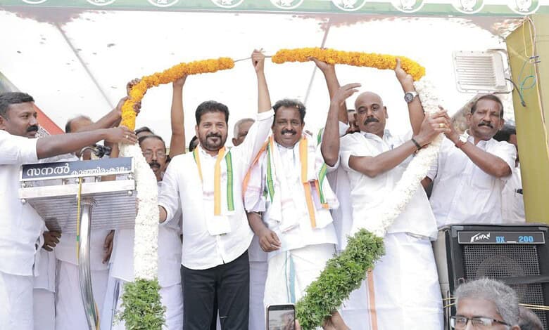 Celebrating Kerala UDF's win with leaders, including Revanth Reddy, at a campaign event.
