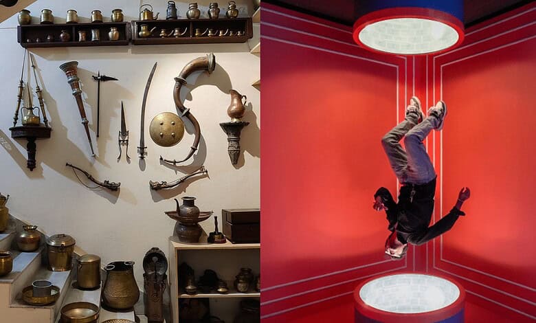 Ancient weapons and artifacts displayed on a museum wall, with a person performing a handstand in a moder.