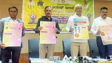 Community health awareness event with officials displaying health posters and promoting wellness initiati.